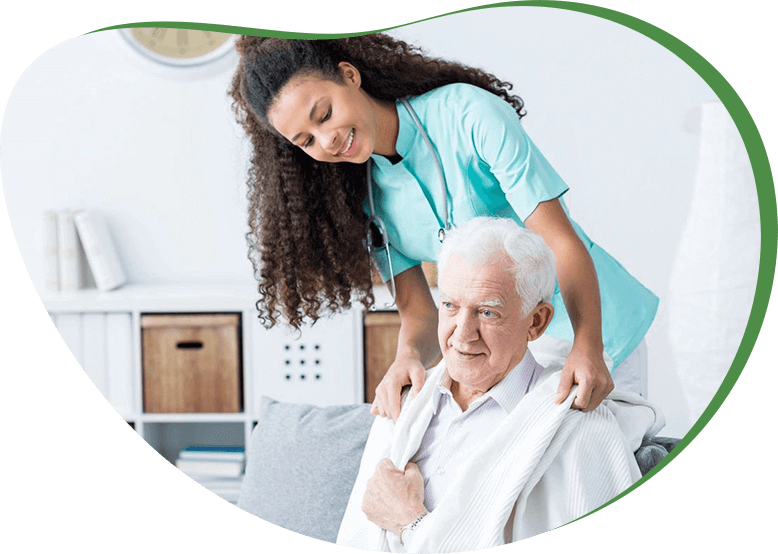 A nurse is helping an elderly man to get up.