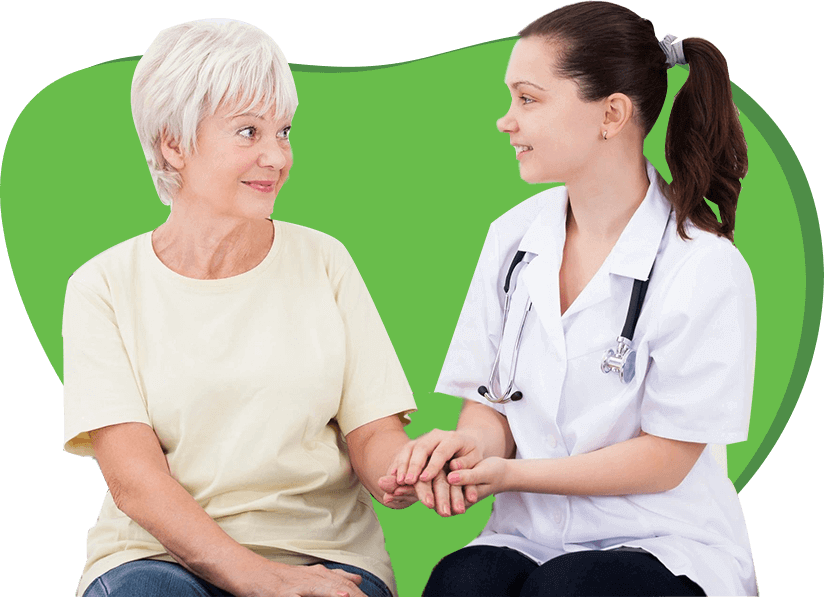 A woman sitting next to another person holding hands.